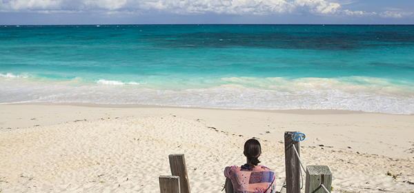 A Woman on the Beach on the Abacos in the Bahamas